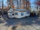 Quaint lakefront cottage with attached garage and RV parking at 101 Lake View Dr, Mount Gilead, NC 27306