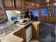 Simple kitchen with double sink and white stove at 101 Lake View Dr, Mount Gilead, NC 27306