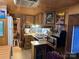 Galley kitchen featuring wood cabinets and a gas range at 101 Lake View Dr, Mount Gilead, NC 27306