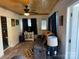 Living area with a sofa, electric fireplace, and TV at 101 Lake View Dr, Mount Gilead, NC 27306