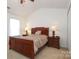 Primary bedroom with large bed and nightstands at 11015 Alderbrook Ln, Charlotte, NC 28270