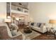 Open living room with high ceilings and loft view at 11015 Alderbrook Ln, Charlotte, NC 28270