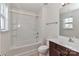 Bathroom with tub, shower, toilet and wood vanity at 11121 Kanturk Ct, Charlotte, NC 28213