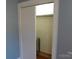 Bedroom closet with sliding doors and hanging rod at 118 Emanuel Church Rd, Rockwell, NC 28138