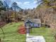 Aerial view of a house with a green yard, and driveway at 2503 Parnell Dr, Shelby, NC 28150