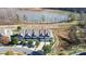 Aerial view of a townhome community near a lake, highlighting the subject property at 4146 La Crema Dr, Charlotte, NC 28214