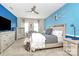 Spacious bedroom with a large bed, dresser, and TV at 4146 La Crema Dr, Charlotte, NC 28214
