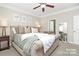 Spacious main bedroom with neutral decor and ceiling fan at 4146 La Crema Dr, Charlotte, NC 28214