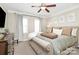 Large main bedroom with plush carpet and neutral decor at 4146 La Crema Dr, Charlotte, NC 28214