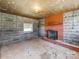 Unfinished basement with brick fireplace and window at 491 Lytton St, Troutman, NC 28166