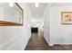 Bright entryway with hardwood floors and wainscoting at 5019 Elementary View Dr, Charlotte, NC 28269