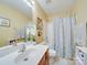 Clean bathroom with tub shower, vanity, and updated fixtures at 5076 Timber Falls Dr, Indian Land, SC 29707