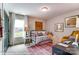 Bedroom with daybed, workspace, and mustard yellow chair at 5238 Verona Rd # 78, Charlotte, NC 28213