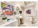 Clean and modern bathroom with a single sink vanity, toilet and grab bars at 703 Hoke Ln, Davidson, NC 28036