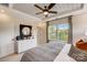 Main bedroom with king bed, dresser, and large windows offering natural light at 703 Hoke Ln, Davidson, NC 28036