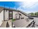 Relaxing rooftop deck with outdoor furniture and city views at 703 Hoke Ln, Davidson, NC 28036