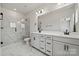 Modern bathroom with double vanity and large shower at 711 Hoke Ln, Davidson, NC 28036