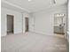 Spacious bedroom with ensuite bathroom and walk-in closet at 711 Hoke Ln, Davidson, NC 28036