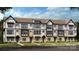 New Townhouse community with inviting front yards and charming architectural details at 711 Hoke Ln, Davidson, NC 28036