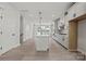 Modern kitchen with island and white cabinetry at 711 Hoke Ln, Davidson, NC 28036