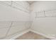 Bright walk-in closet with wire shelving at 711 Hoke Ln, Davidson, NC 28036