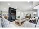 Open living area featuring a black brick fireplace and built-ins at 8520 Gruenewald Ln, Charlotte, NC 28210