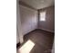 White louvered closet doors in a small room with wood flooring at 908 E Main St, Maiden, NC 28650