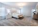 Elegant main bedroom with a plush bed and soft color scheme at 9601 Pointer Rd # 77, Huntersville, NC 28078