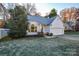 Inviting home with white siding, attached garage, and a neatly landscaped front yard at 9709 Calpher Ct, Matthews, NC 28105