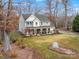 Two-story house nestled in a wooded area with a large yard at 10827 Hadrians Walk Ct, Mint Hill, NC 28227