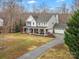 Two-story house with a large yard and driveway at 10827 Hadrians Walk Ct, Mint Hill, NC 28227