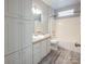 Bathroom with shower/tub combo and vanity with storage at 1649 Wolf Rd, Iron Station, NC 28080