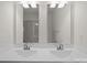 Double vanity bathroom with modern fixtures and large mirrors at 1725 Aspire St, Charlotte, NC 28262
