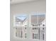 Well-lit bedroom featuring two large windows with blinds at 1725 Aspire St, Charlotte, NC 28262