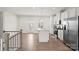 Modern kitchen with island, granite countertops, and stainless steel appliances at 1725 Aspire St, Charlotte, NC 28262