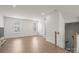 Open living area with hardwood floors and natural light at 1725 Aspire St, Charlotte, NC 28262