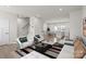 Open-concept living area with hardwood floors and a view of the kitchen at 1725 Aspire St, Charlotte, NC 28262