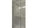Clean shower with glass enclosure and neutral tile at 1725 Aspire St, Charlotte, NC 28262