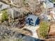 Modern two-story blue home with attached garage and concrete driveway, seen in an aerial view at 202 Phillip Dr, Salisbury, NC 28146