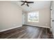 Spacious bedroom with vaulted ceiling, ceiling fan, and large window at 202 Phillip Dr, Salisbury, NC 28146