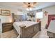 Spacious bedroom with large bed, ceiling fan, and ample storage at 313 Holt Rd, Albemarle, NC 28001