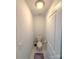 Small bathroom with toilet and flooring at 5124 Hucks Rd, Charlotte, NC 28269