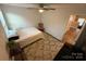 Bedroom with a bed and ceiling fan at 5124 Hucks Rd, Charlotte, NC 28269