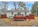 Home features a deck and hot tub at 790 Stanley Spencer Mtn Rd, Gastonia, NC 28056