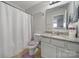 Bathroom with shower/tub combo and granite vanity at 8411 Washoe Pine Ln, Charlotte, NC 28215