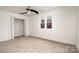 Simple bedroom with closet and neutral decor at 8823 Dartmoor Pl, Mint Hill, NC 28227