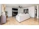 Bright living room with fireplace and light hardwood floors at 8823 Dartmoor Pl, Mint Hill, NC 28227