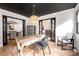 Bright home office with built-in shelving and French doors at 8823 Dartmoor Pl, Mint Hill, NC 28227