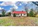 Charming house with red metal roof and landscaped yard at 1022 Beverly Dr, Rock Hill, SC 29730