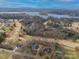 Aerial view showing house's location near golf course and lake at 1115 Stony Point Rd, Kings Mountain, NC 28086